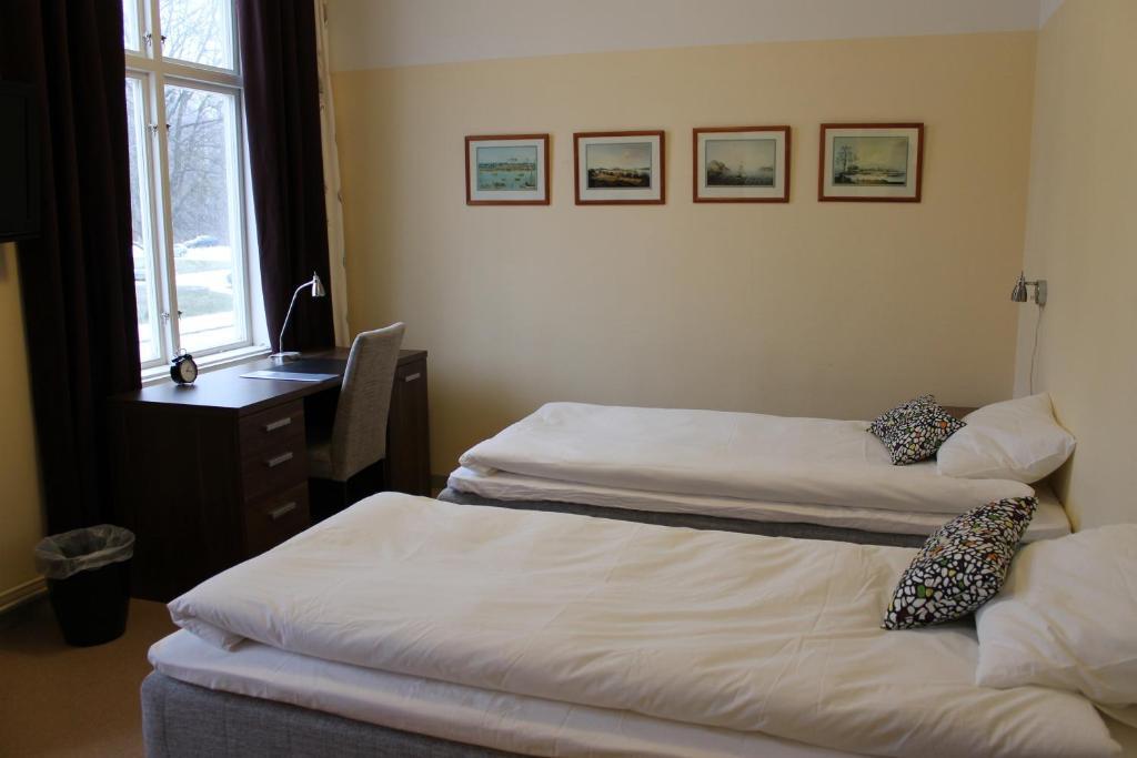 Stationshusets Hotell Och Cafe Köping Habitación foto